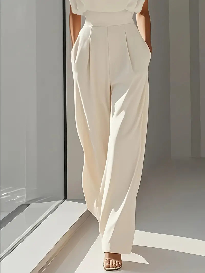 Combinaison femme sans manches pantalon large taille haute drapée coupe fluide cérémonie
