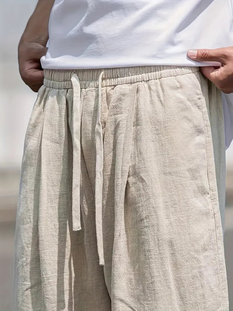 Pantalon homme en lin coupe parachute à cordon style ample été respirant