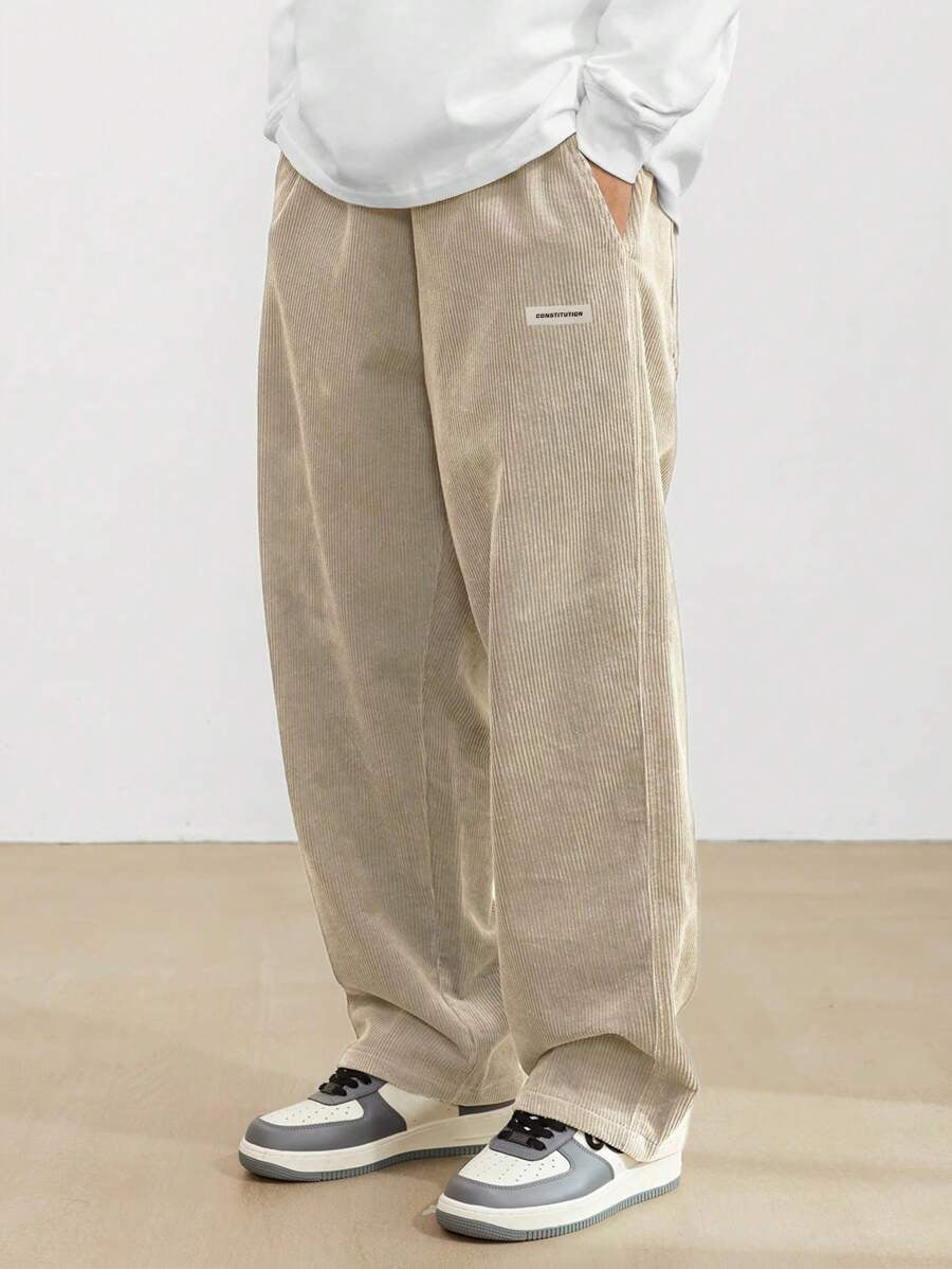 Pantalon homme en velours côtelé coupe baggy taille élastique jambes larges