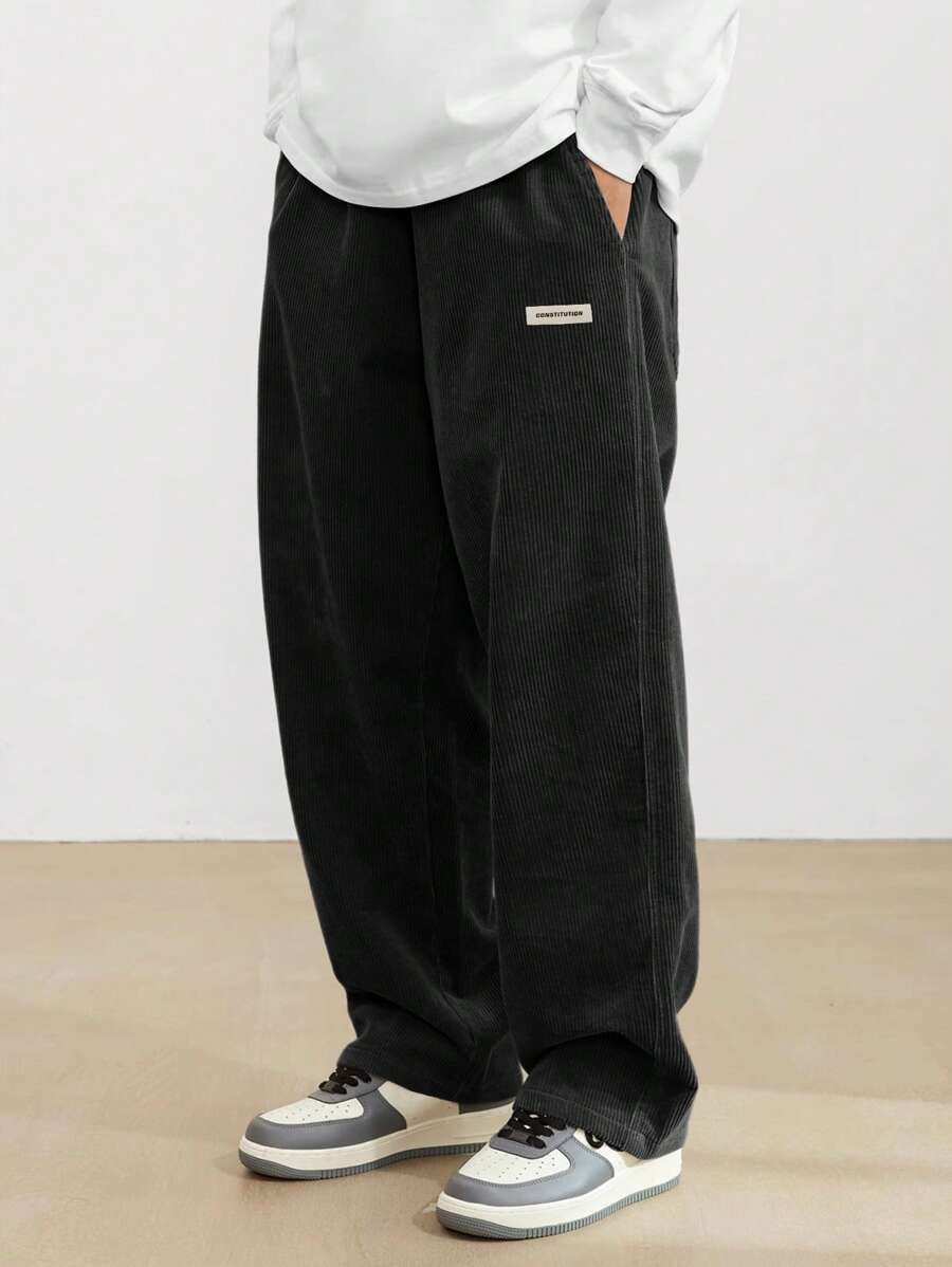 Pantalon homme en velours côtelé coupe baggy taille élastique jambes larges