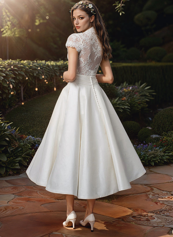 Robe de mariée midi dentelle col V manches courtes évasée