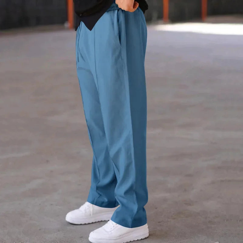 Pantalon homme coupe ample style costume avec cordon de serrage et plis marqués
