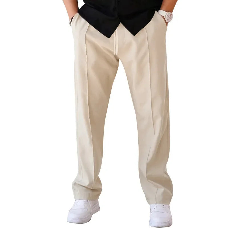 Pantalon homme coupe ample style costume avec cordon de serrage et plis marqués