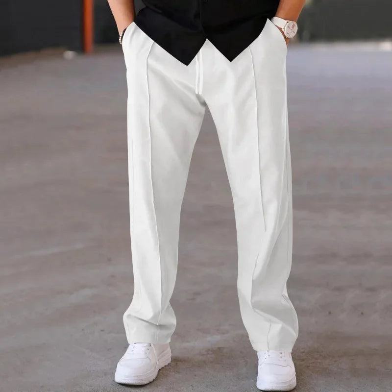 Pantalon homme coupe ample style costume avec cordon de serrage et plis marqués