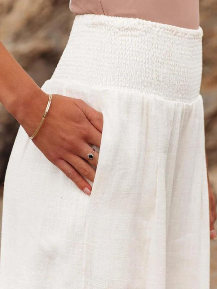 Pantalon large femme en lin taille smockée coupe palazzo fluide