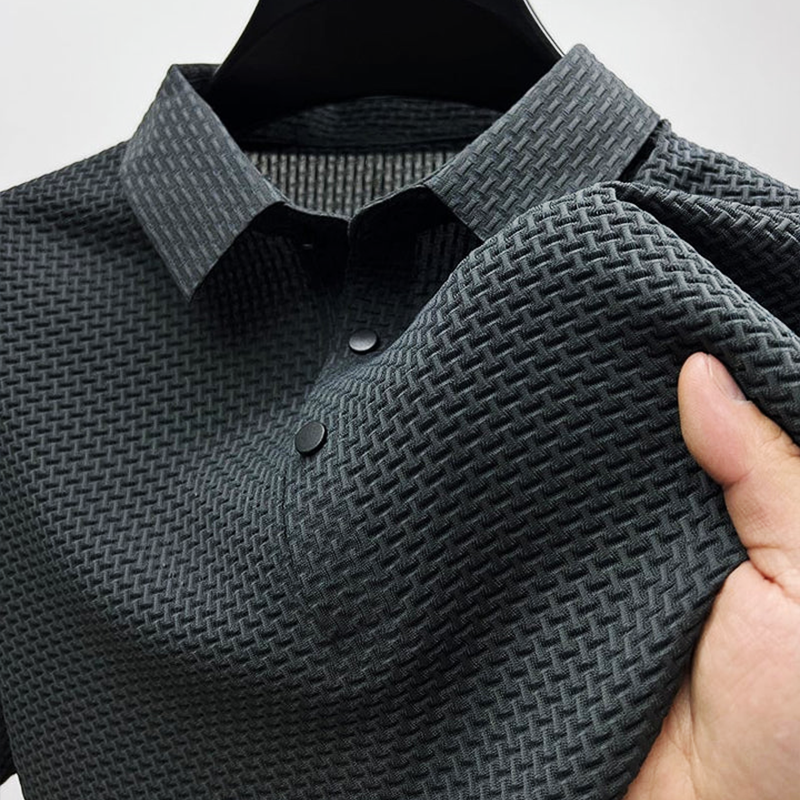 Polo homme manches courtes texturé maille respirante col boutonné coupe ajustée