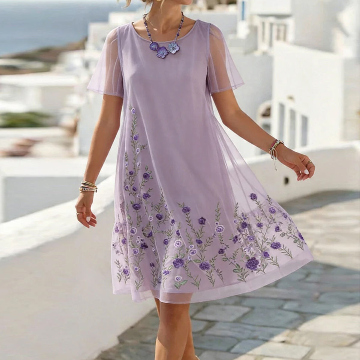 Robe femme brodée manches courtes tulle col rond coupe évasée midi