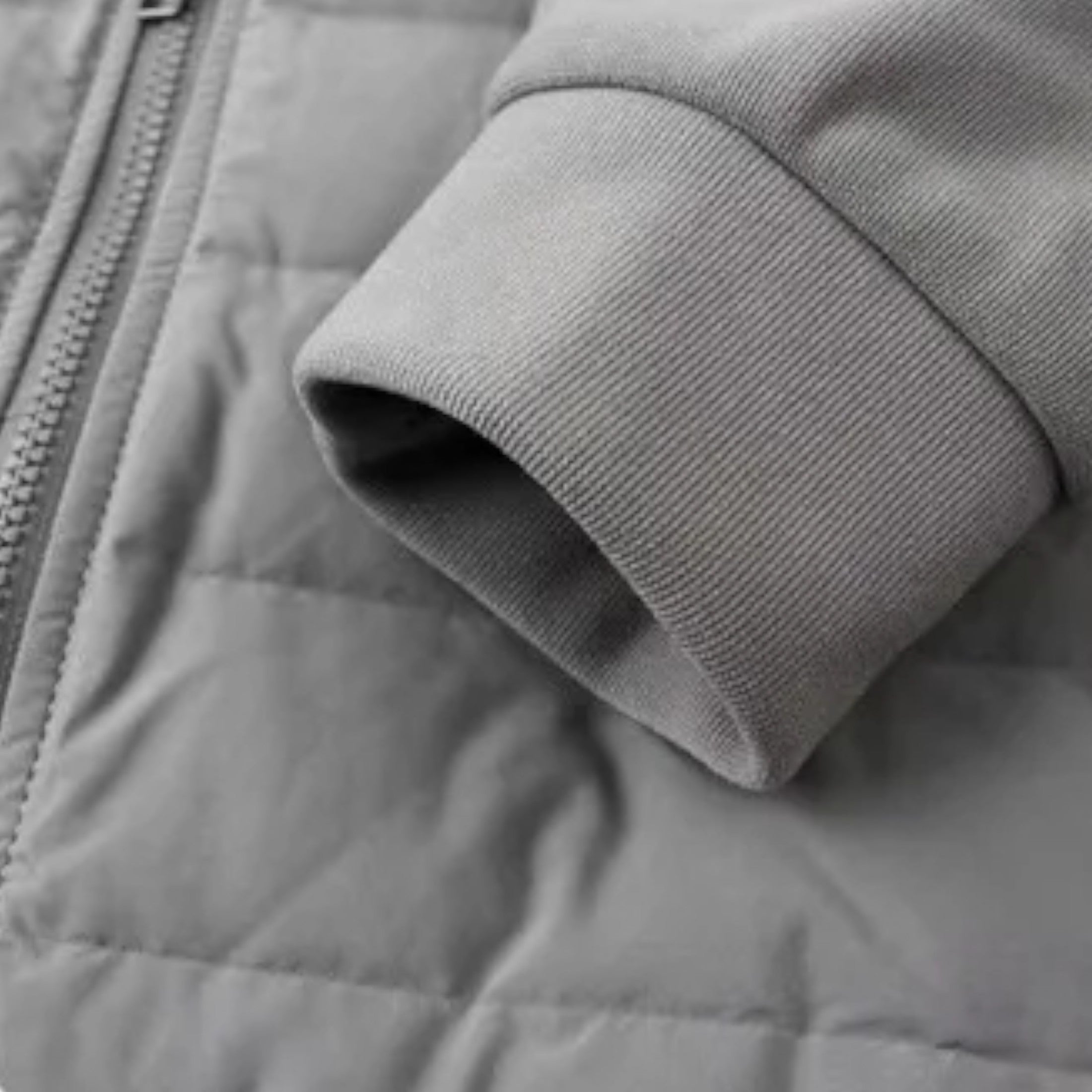 Doudoune homme matelassée à capuche fermeture zippée coupe droite