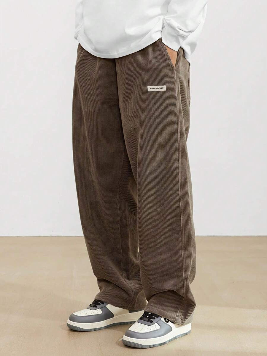 Pantalon homme en velours côtelé coupe baggy taille élastique jambes larges
