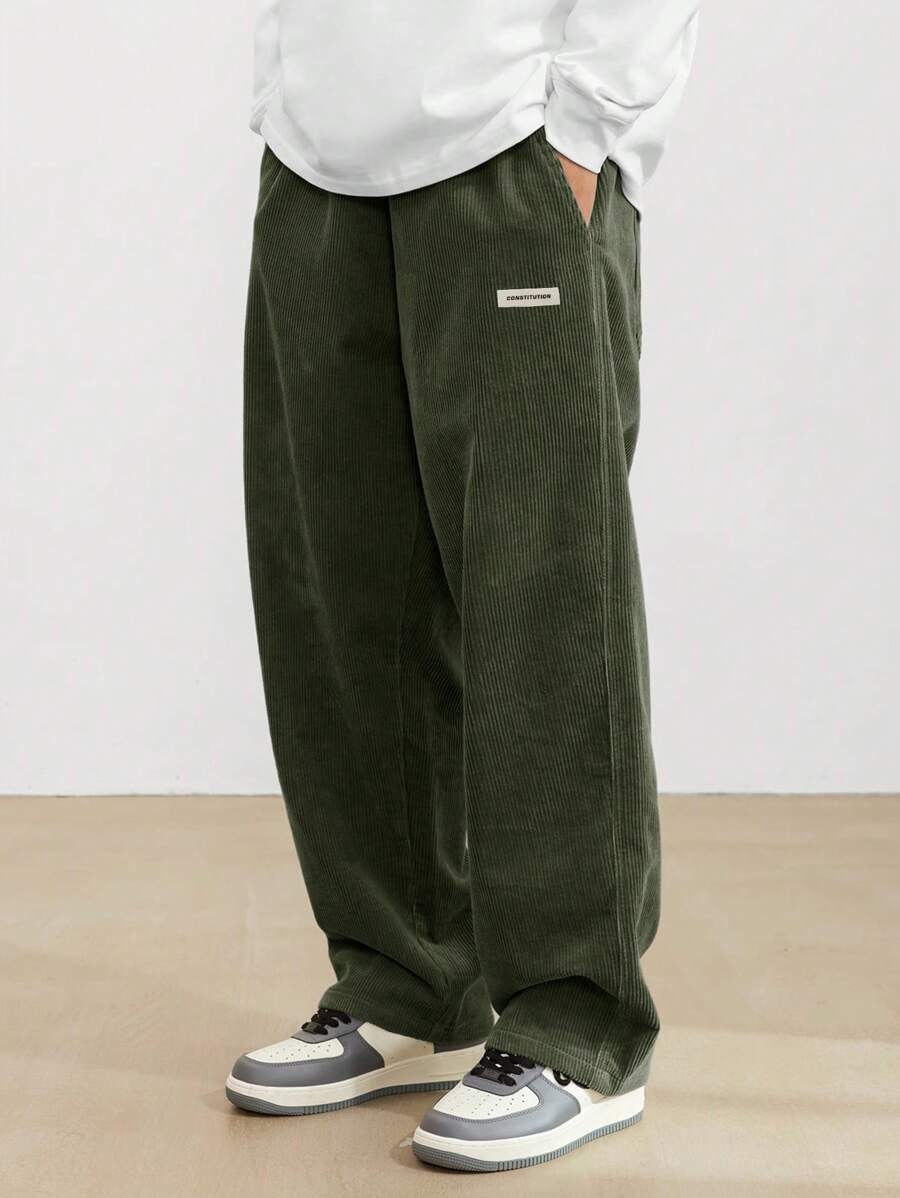 Pantalon homme en velours côtelé coupe baggy taille élastique jambes larges