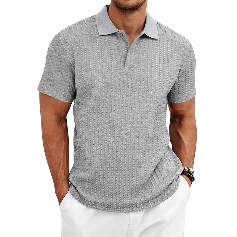 Polo homme maille texturée manches courtes col boutonné coupe ajustée