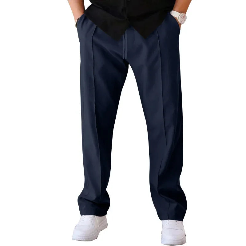 Pantalon homme coupe ample style costume avec cordon de serrage et plis marqués