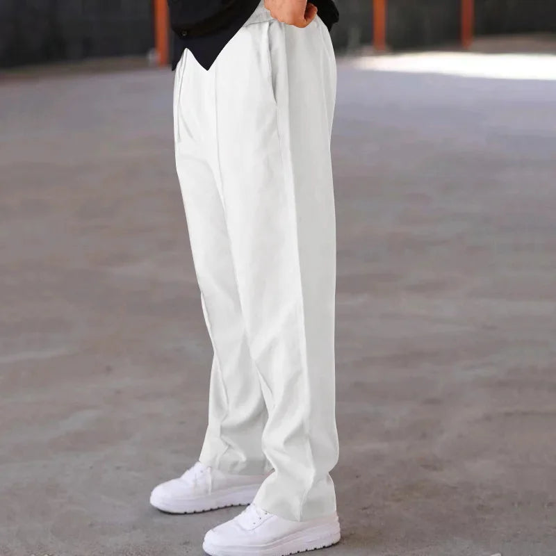 Pantalon homme coupe ample style costume avec cordon de serrage et plis marqués