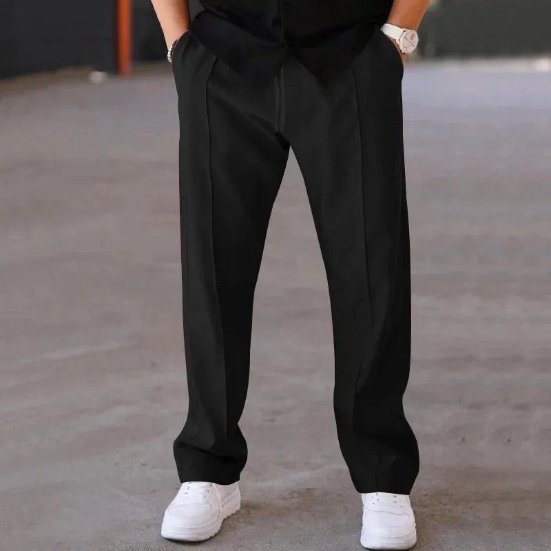 Pantalon homme coupe ample style costume avec cordon de serrage et plis marqués