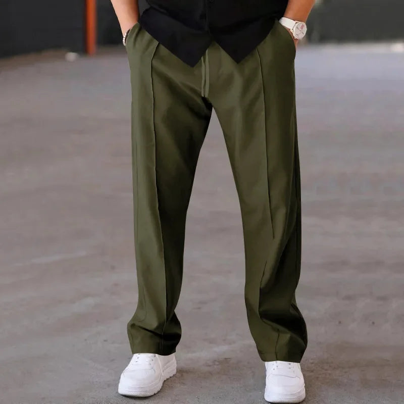 Pantalon homme coupe ample style costume avec cordon de serrage et plis marqués
