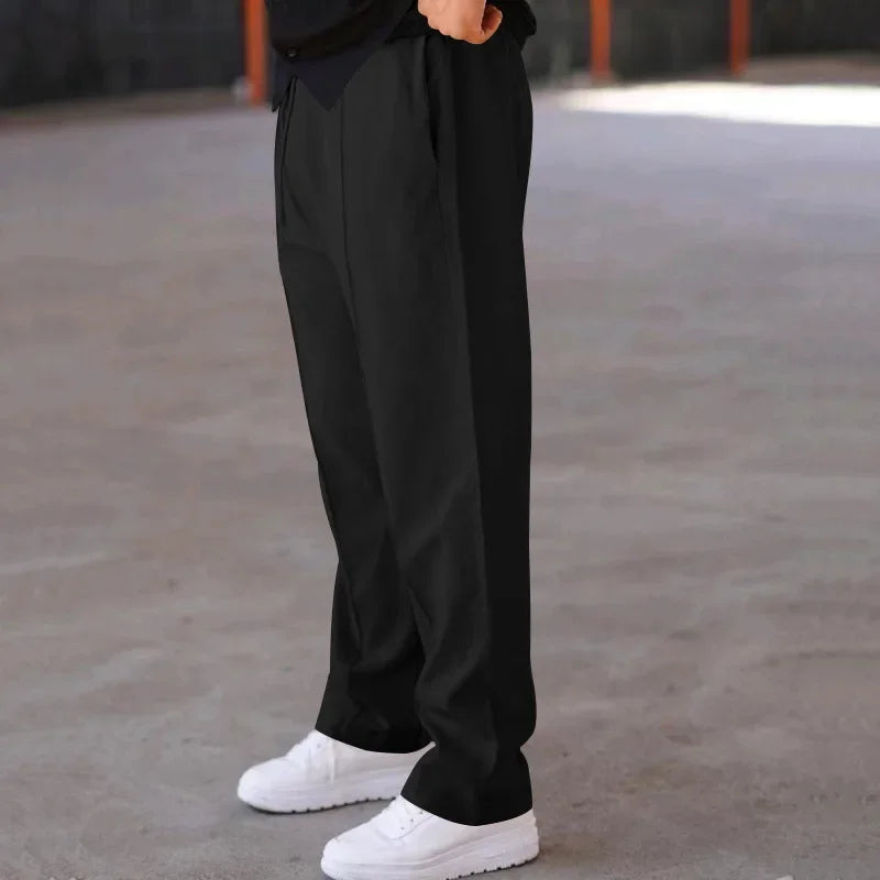 Pantalon homme coupe ample style costume avec cordon de serrage et plis marqués