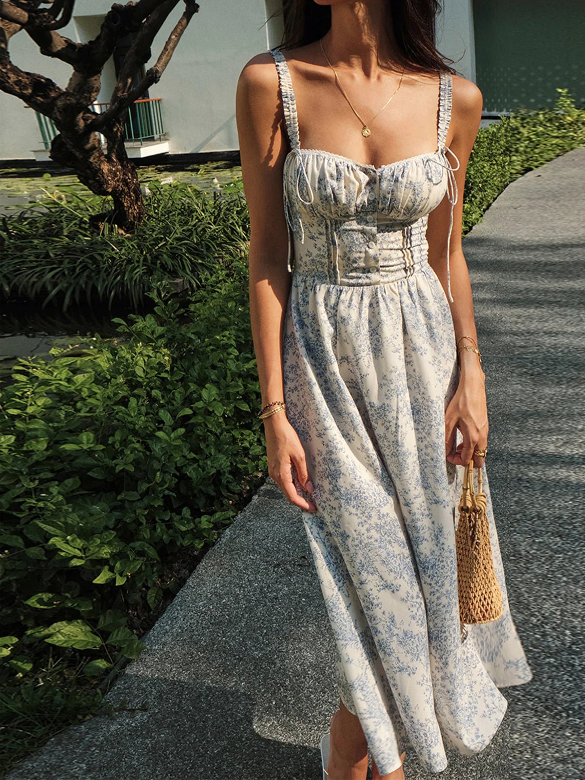 Robe midi femme imprimé floral bretelles fines taille smockée boutonnée devant