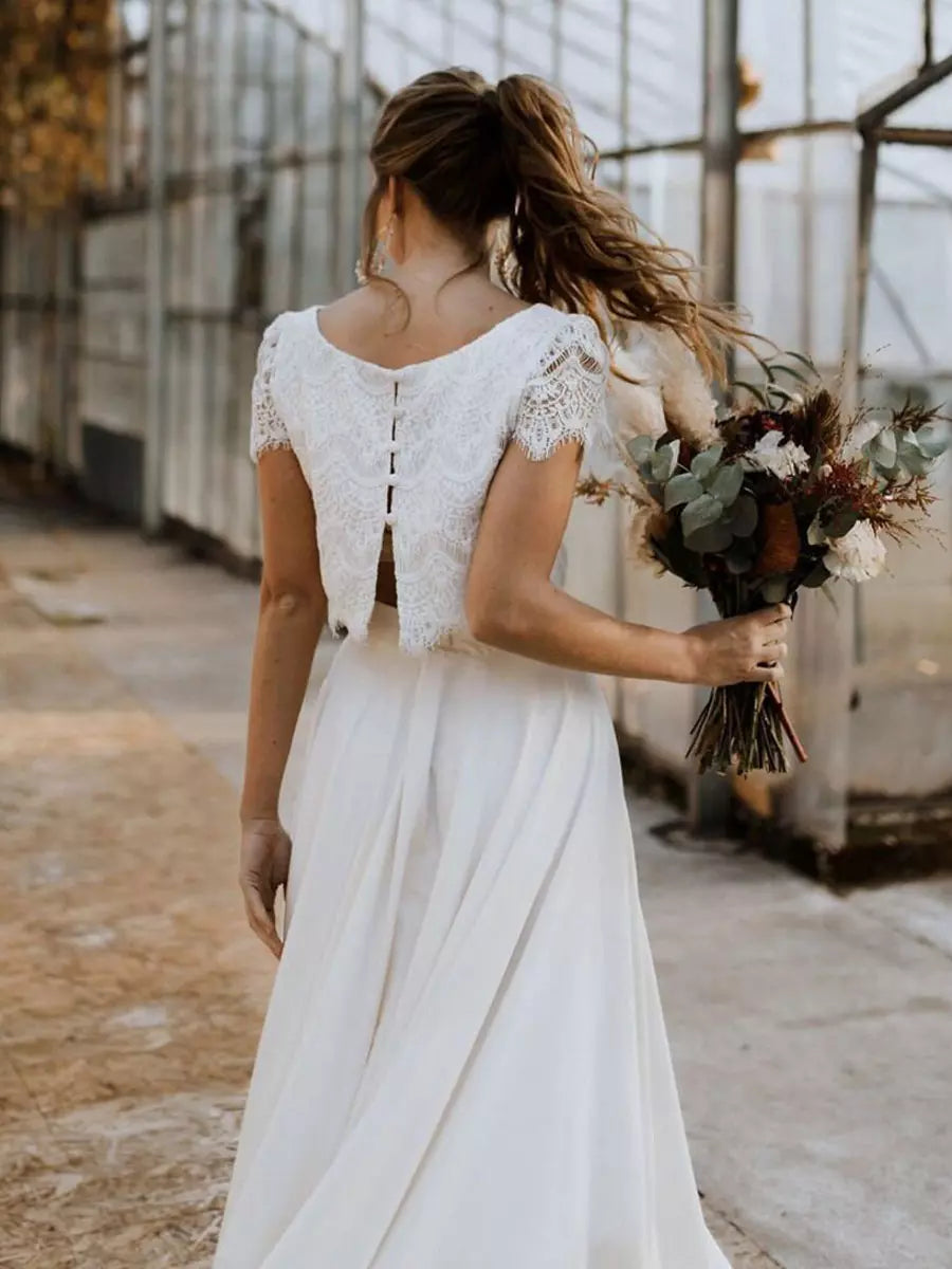 Robe de mariée deux pièces dentelle top court jupe longue fluide