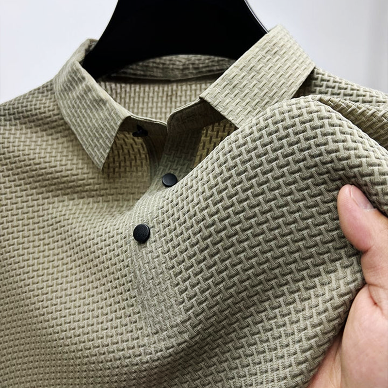Polo homme manches courtes texturé maille respirante col boutonné coupe ajustée